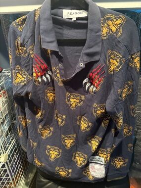 REASON Navy Polo with Gold Panther Faces and Red Claw Embroidery